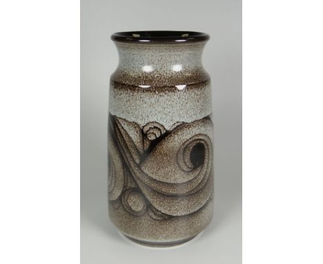 A POOLE POTTERY VASE of slightly tapering form with inverted neck and having a mottled glaze and abstract decoration, marked 