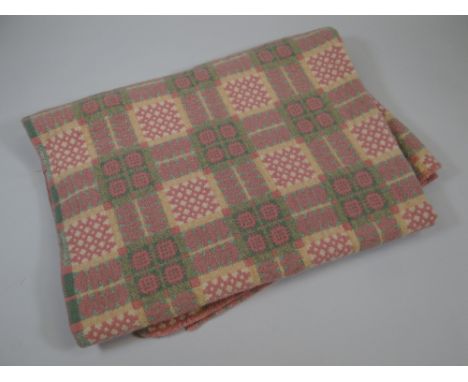 A VINTAGE WOOL WELSH BLANKET typically patterned in pink and green geometric check (BBC Bargain Hunt)condition report:there a