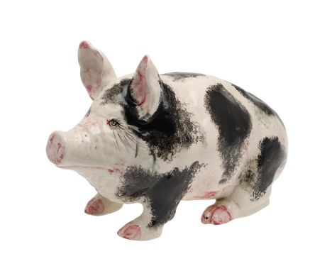 A large Wemyss pig made at the Exon Pottery in Devon, painted in black and white and splashes of pink. With painted and impre