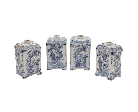 Probably 18thc, an unusual set of four blue and white delft tea caddies, each side painted with figures beside flowering tree
