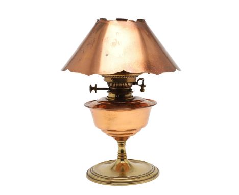 An oil lamp attributed to W.A.S Benson, the lamp base made in brass and copper and with a Hinks &amp; Son lamp fitting. With 
