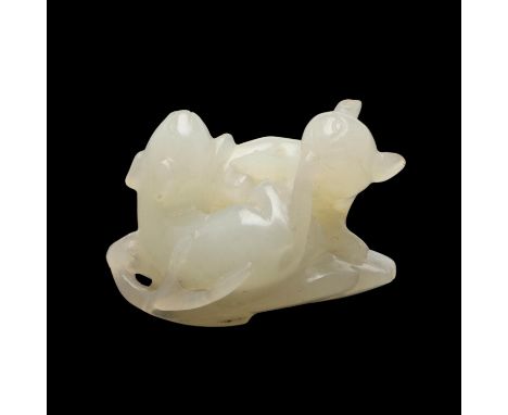 Probably early to mid 20thc, a small pale jade carving of two entwined animals seated on a leaf. 3.5cms long.  *CR  Seems in 