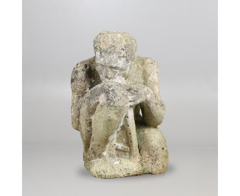 A large carved stone sculpture of 'The Piper', the figure crouched with the instrument reaching it's feet. With an incised si