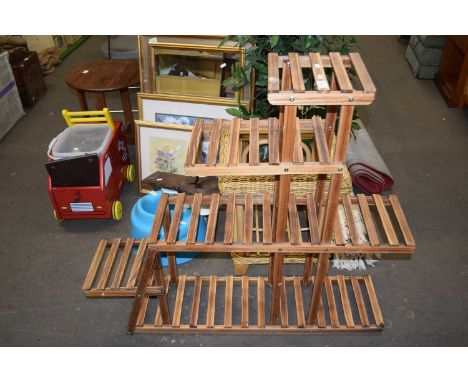 A wooden plant stand