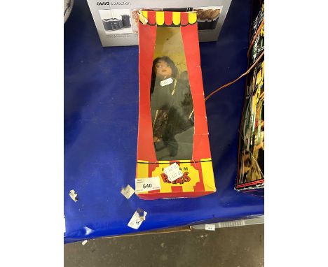 A boxed puppet of a fortune teller