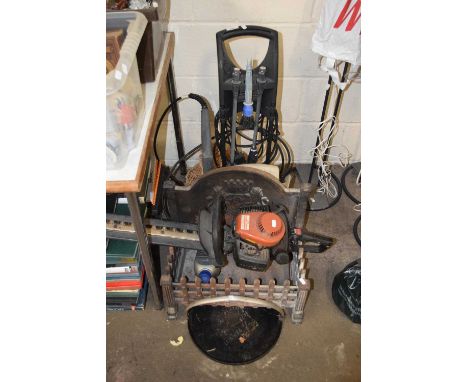 A pressure washer together with a cast iron fire grate and a Wolf hedgecutter and an iron skillet pan (4)