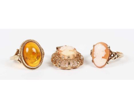 A 9ct gold mounted oval shell cameo pendant, carved as a portrait of a lady, a similar gold mounted oval shell cameo ring, de