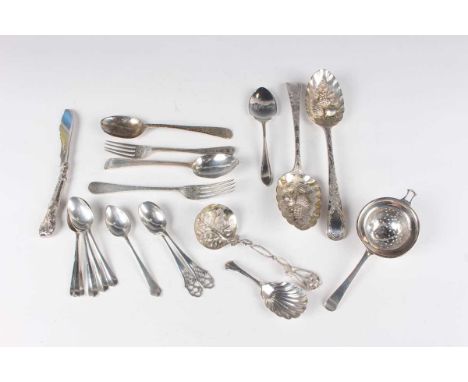 An early Victorian silver sifter spoon, the circular bowl with pierced and engraved foliate decoration, wirework scrolling st