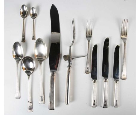 An Elkington &amp; Co part canteen of plated cutlery with engine turned decoration, comprising four tablespoons, twelve table