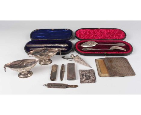 A late Victorian silver christening fork and spoon with embossed and engraved decoration, London 1895 and 1896 by Edward Barn