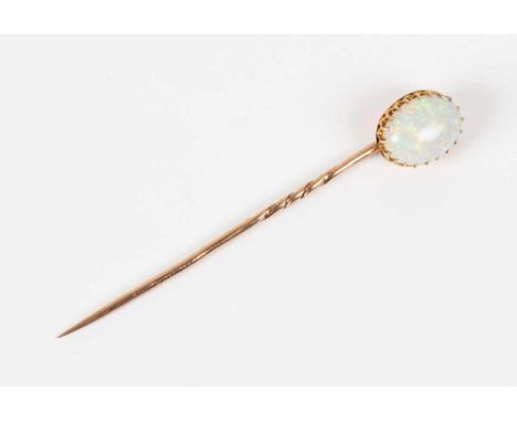 A gold stickpin, claw set with an oval opal, unmarked, weight 1.7g, opal dimensions approx 10.2mm x 8mm x 3.5mm.