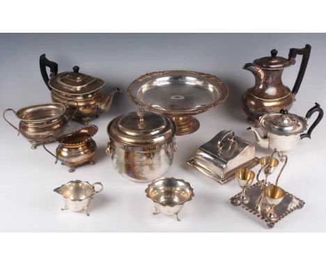 A collection of plated items, including an oval galleried two-handled tea tray, a four-piece tea set, an oval bread board sta