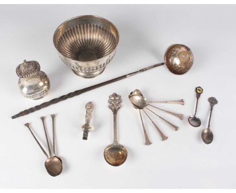 An Edwardian silver half-reeded sugar bowl on a circular domed foot, Birmingham 1905, diameter 11.5cm, and a small group of o
