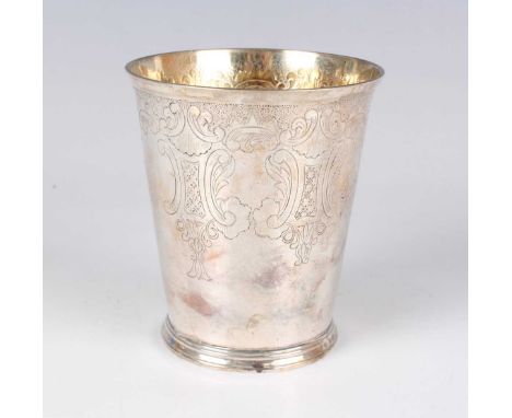 A George III silver beaker of tapering cylindrical form, engraved with stylized scallop shells above lappet and pendant decor