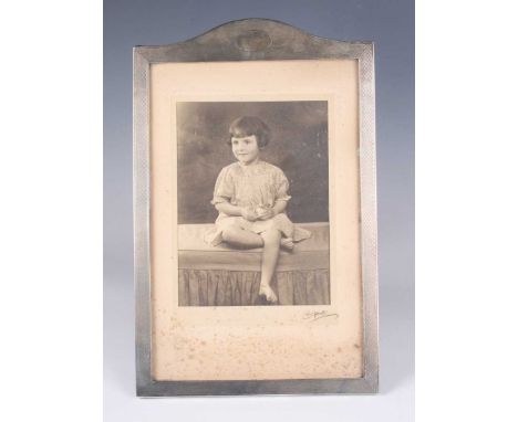 A George V silver mounted oak backed rectangular engine turned photograph frame with arched top, Birmingham 1925 by Sanders &