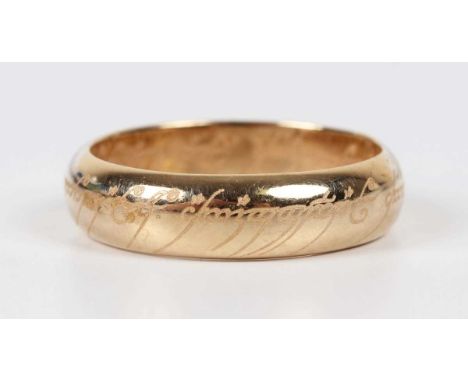 A 9ct gold 'Lord of the Rings' wedding band ring, weight 6.5g, ring size approx T1/2.