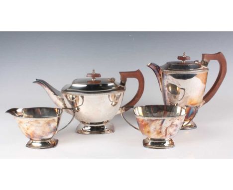 An Elizabeth II silver four-piece tea set of rectangular tapering form with gadrooned rims and rectangular bases, comprising 