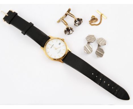 A lot to include a pair of white metal hexagonal shaped cufflinks with machine engraving, unmarked, a yellow metal tie pin, u