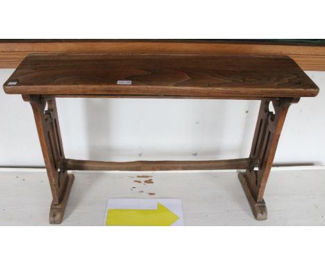 A light oak 19th century child's desk with under tier and stretcher.58.5cm x 89.5cm