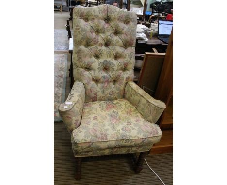A button backed 19th Queen Anne design armchair with bobbin turned legs &amp; stretcher