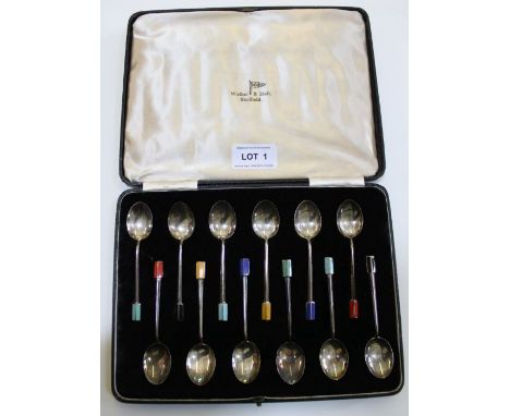 A set of twelve enamel spoons 97g