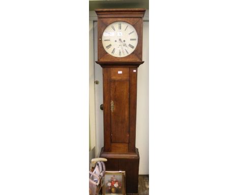 A 19th century oak cased, long cased clock. Circular painted dial, one pendulum, two weights.