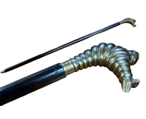 Automobilia &amp; Advertisement - a novelty walking stick with bronze Bibendum (Michelin Man) pommel, ebonised shaft, 97cm