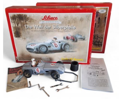 A Schuco Studio VII Bausatz - Mercedes-Benz W196 Stirling Moss 1953 Monaco Grand Prix, built factory silver painted kit, tool