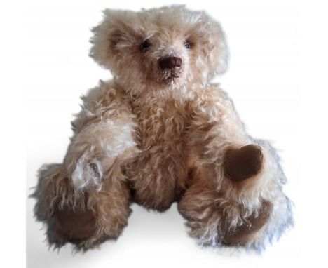 A Linny K Collectors Bear, Schulte Mohair, musical, stiff jointed bear, glass eyes, brown stitched nose, suede pads