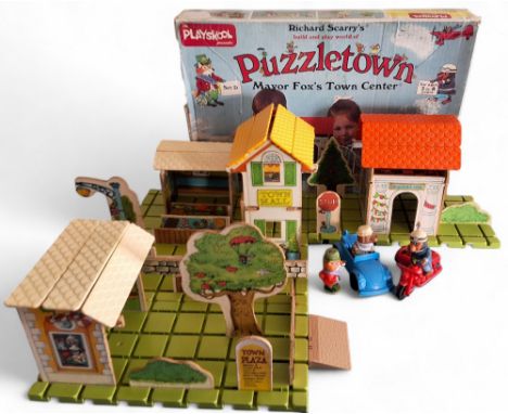 A vintage Playskool presents Richard Scarry's build&nbsp;and play world of Puzzletown Mayor Fox's Town Center (sic) set D, in