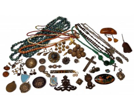 A naturalistic amber brooch, two butterscotch amber drops; an amber pendant;&nbsp;WW1 Ypres Menin Gate Pilgrimage medal; a si