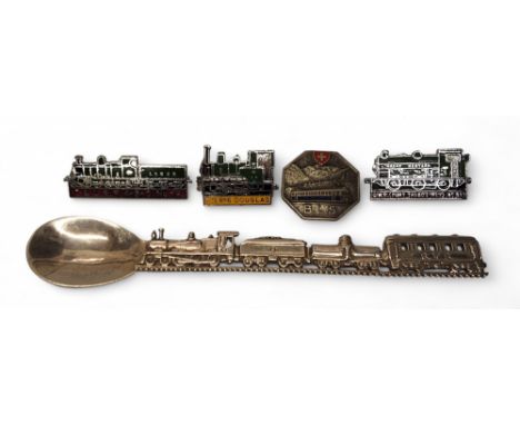 A novelty silver spoon, the haft cast with a 4-6-0 locomotive and tender, tanker and passenger coach stamped R.V.R., 15cm;&nb