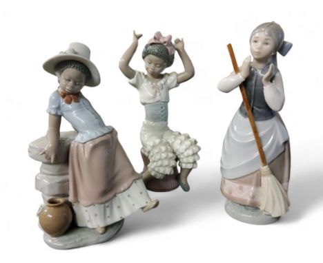 A Lladro figure, Rumba, 5160;&nbsp; others, A Step in Time, 5158;&nbsp; Clean Sweep, 5025 (3)