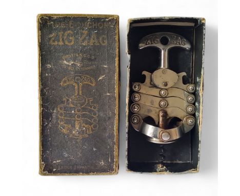 An early 20th century French 'Le Tire-Bouchon' Zig-Zag corkscrew in original box