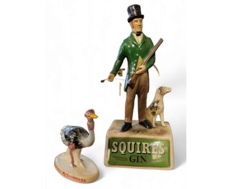 A Carlton Ware My Goodness, My Guinness ostrich, 10.5cm high, red mark;&nbsp; a&nbsp; Squires Gin figural advertising figure,