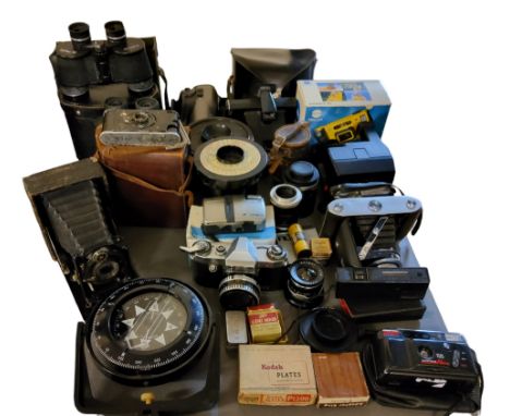 A Praktica NTL5 film camera, Carl Zeiss Jena lens;&nbsp; other lenses;&nbsp; &nbsp;an Ensign Selfix 820 folding camera;&nbsp;