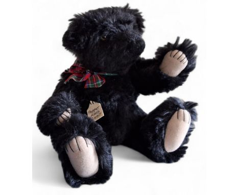A Linny K Collector Bears, Pepper March 2007, black bear, stiff jointed,&nbsp;growler, glass eyes, stitched nose, felt pads, 