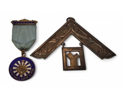A silver Past Masters jewel, cast in relief with sinuous vines, Richard Spencer, Birmingham, 1938, 75g; a silver gilt and ena