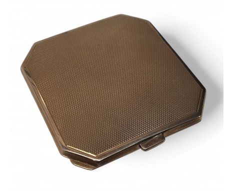 A silver canted square compact, engine turned, 6.5cm wide, Turner &amp; Simpson, Birmingham, 1971, 78.3g gross