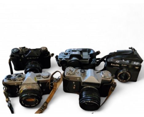 Cameras - an Olympus OM-1;&nbsp; &nbsp;Minolta 110 zoom;&nbsp; &nbsp;Zenit TTL;&nbsp; Zenit E;&nbsp; &nbsp;etc