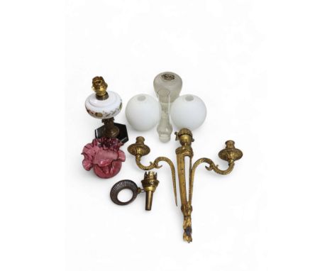A 19th gilt metal two light, two branch side light, 41cm high, c.1850;&nbsp; &nbsp; an early 20th century oil lamp, milk glas