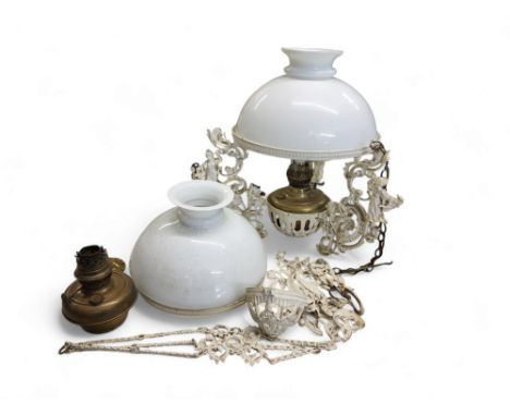 A British Made ceiling oil lamp, with white domed shade, the cast brackets with ladies, flowers and scrolls, 53cm high, c.191