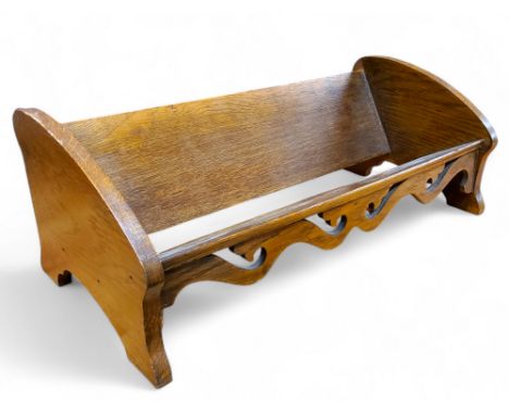 A golden oak book trough, 15cm x 46cm x 21cm
