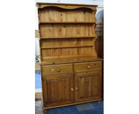 A Modern Pine Kitchen Dresser with Two Centre Drawers and Three Shelf Plate Rack, 110cm Wide 