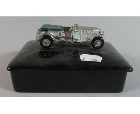 A Black Ceramic Desk Top Box with Vintage Bentley Racing Car Mount, 14cm Long 