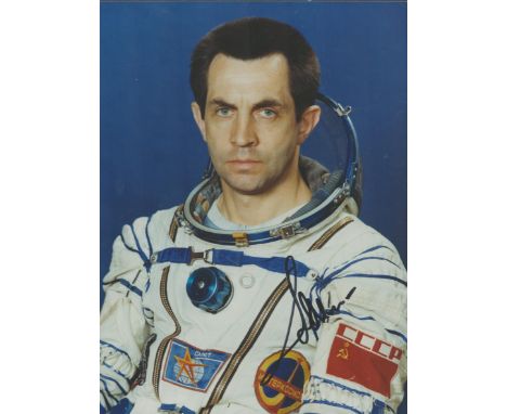 Cosmonaut Alexandra Ivanchenkov signed colour portrait photo 8 x 6 inches. Nice pose in white space suit of the veteran cosmo