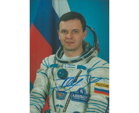 Cosmonaut Yuri Gidzenko signed colour portrait photo 8 x 6 inches. Nice pose in white space suit of the veteran astronaut. Go