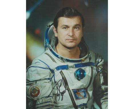 Cosmonaut Vladimir Titov signed colour portrait photo 8 x 6 inches. Nice pose in white space suit of the veteran astronaut. G