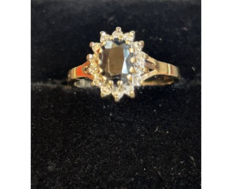 9ct gold ring set with sapphire(?) and white stones Size K