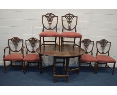 A SET OF SIX MAHOGANY PRINCE OF WALES BACK DINING CHAIRS, including one carver, together with an oak gate leg table (7)